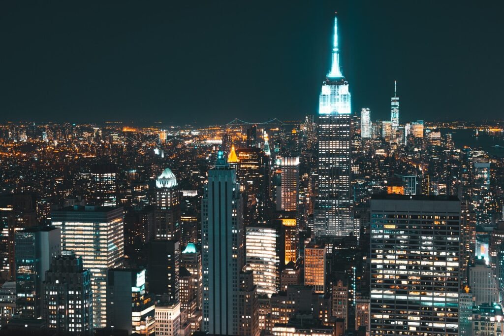 america, architecture, buildings, city, cityscape, evening, illuminated, lights, manhattan, midtown, night sky, new york, new york city, nyc, night, outdoors, pinnacle, nature, sky, skyline, skyscrapers, tower, travel, usa